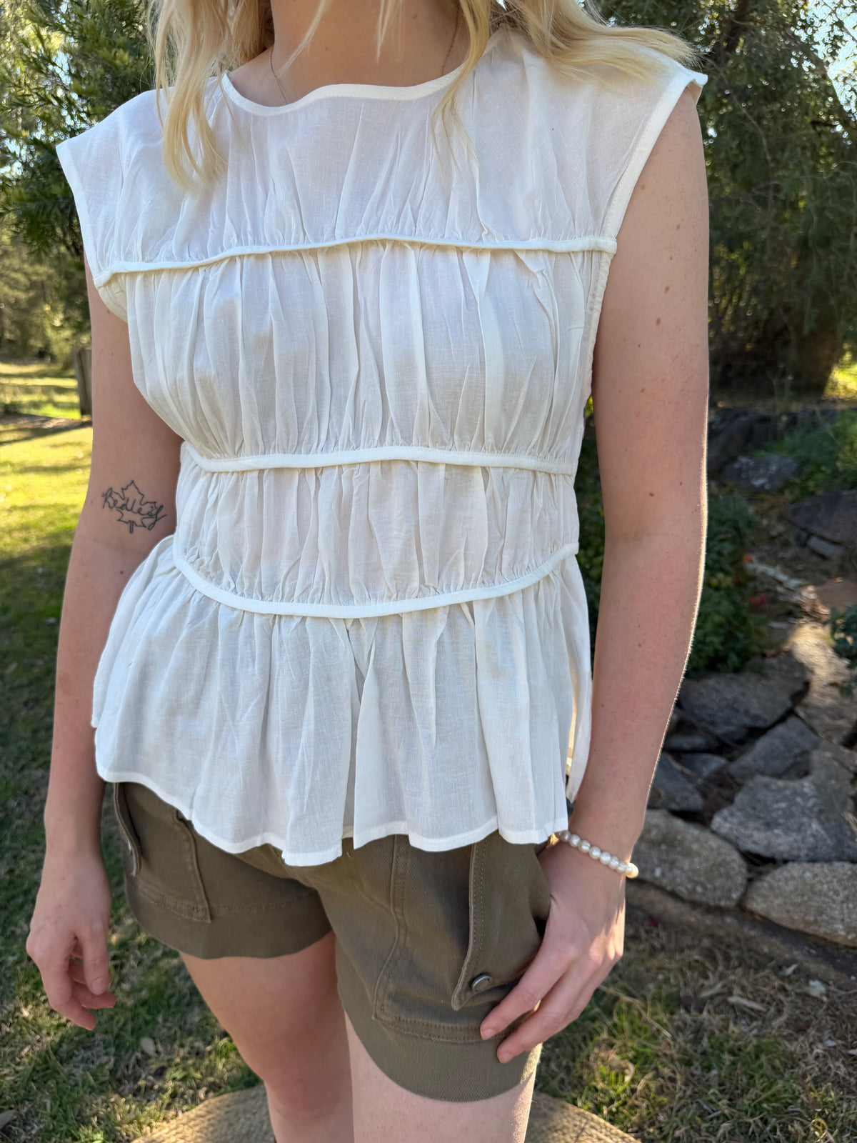 The Saffron Pintuck Top white