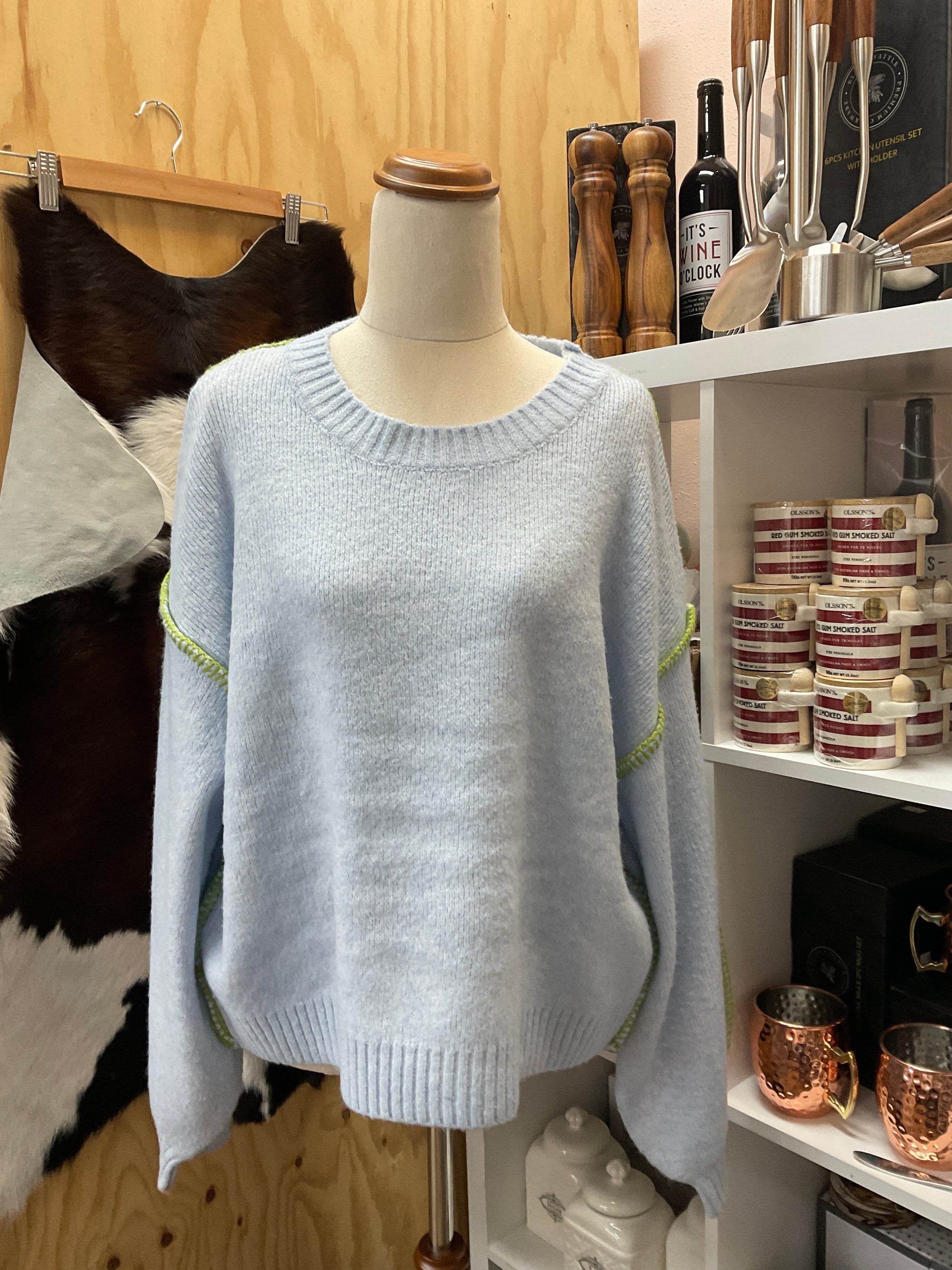 Blue knit with green stitching