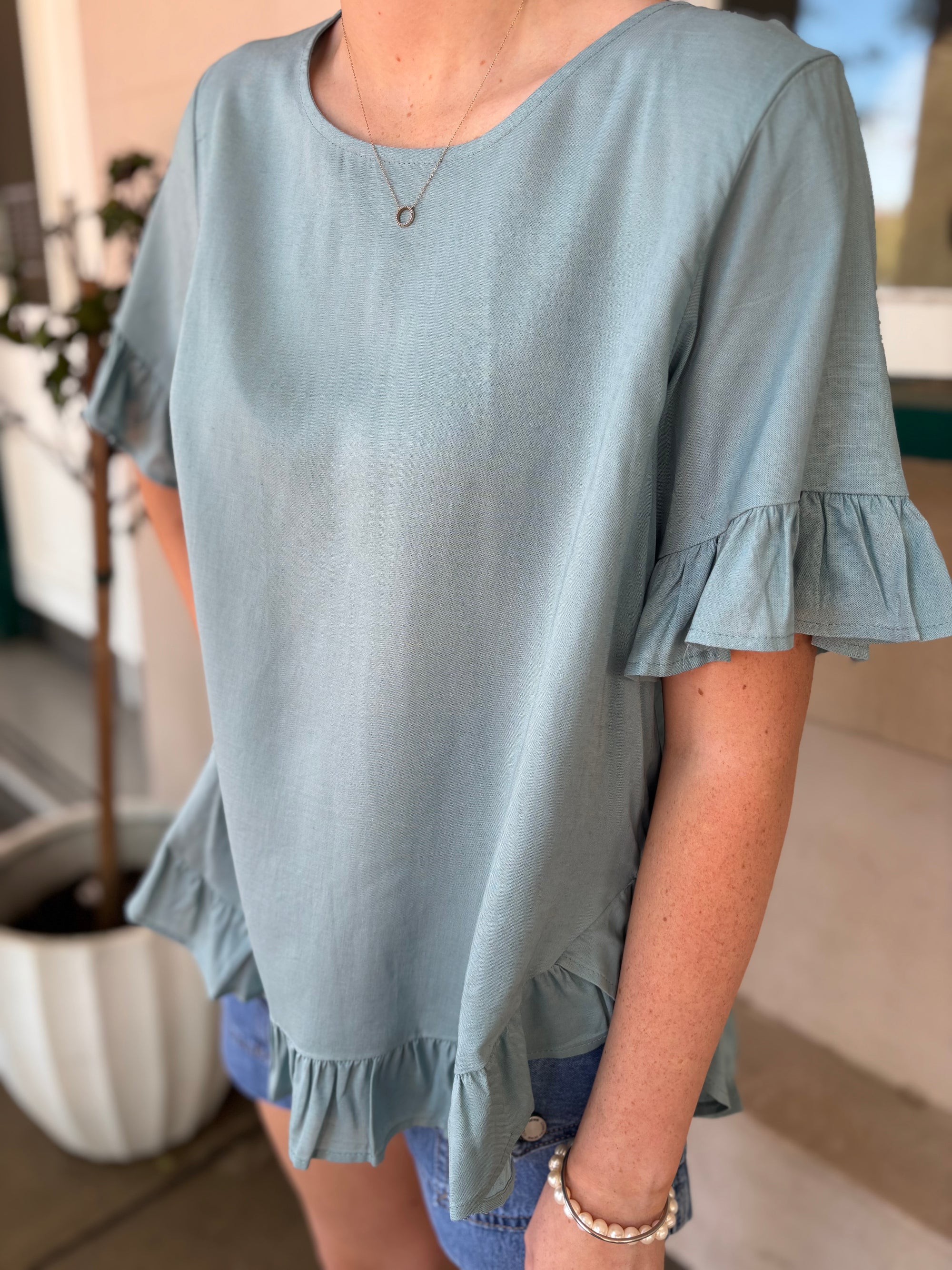 Teal swing top