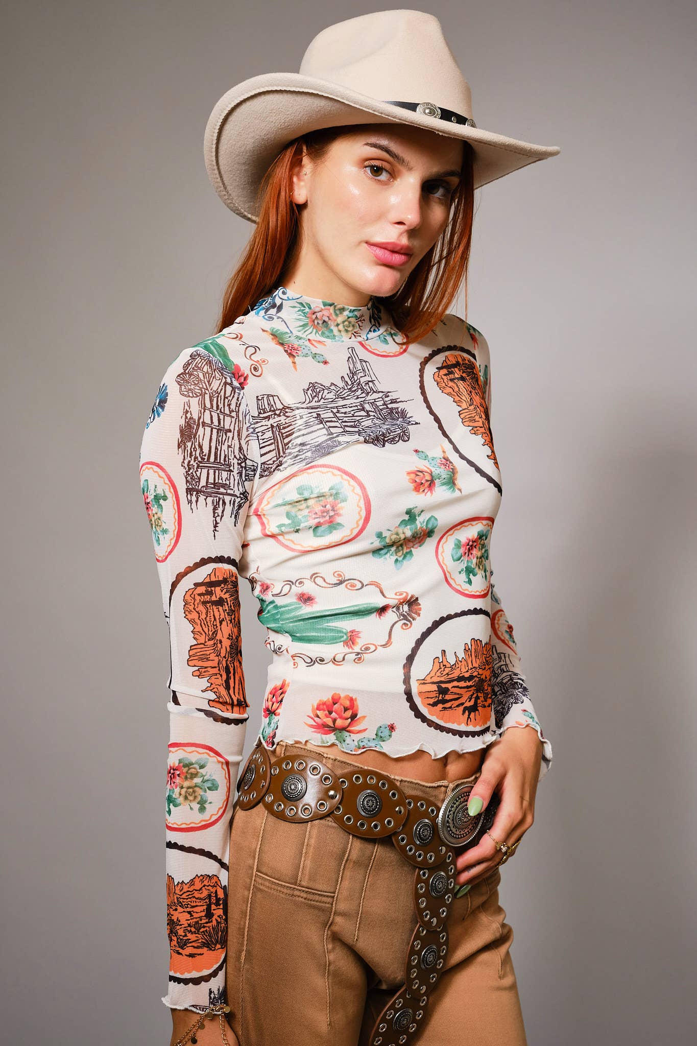 33147T Western Motif Mesh Mock Neck Top