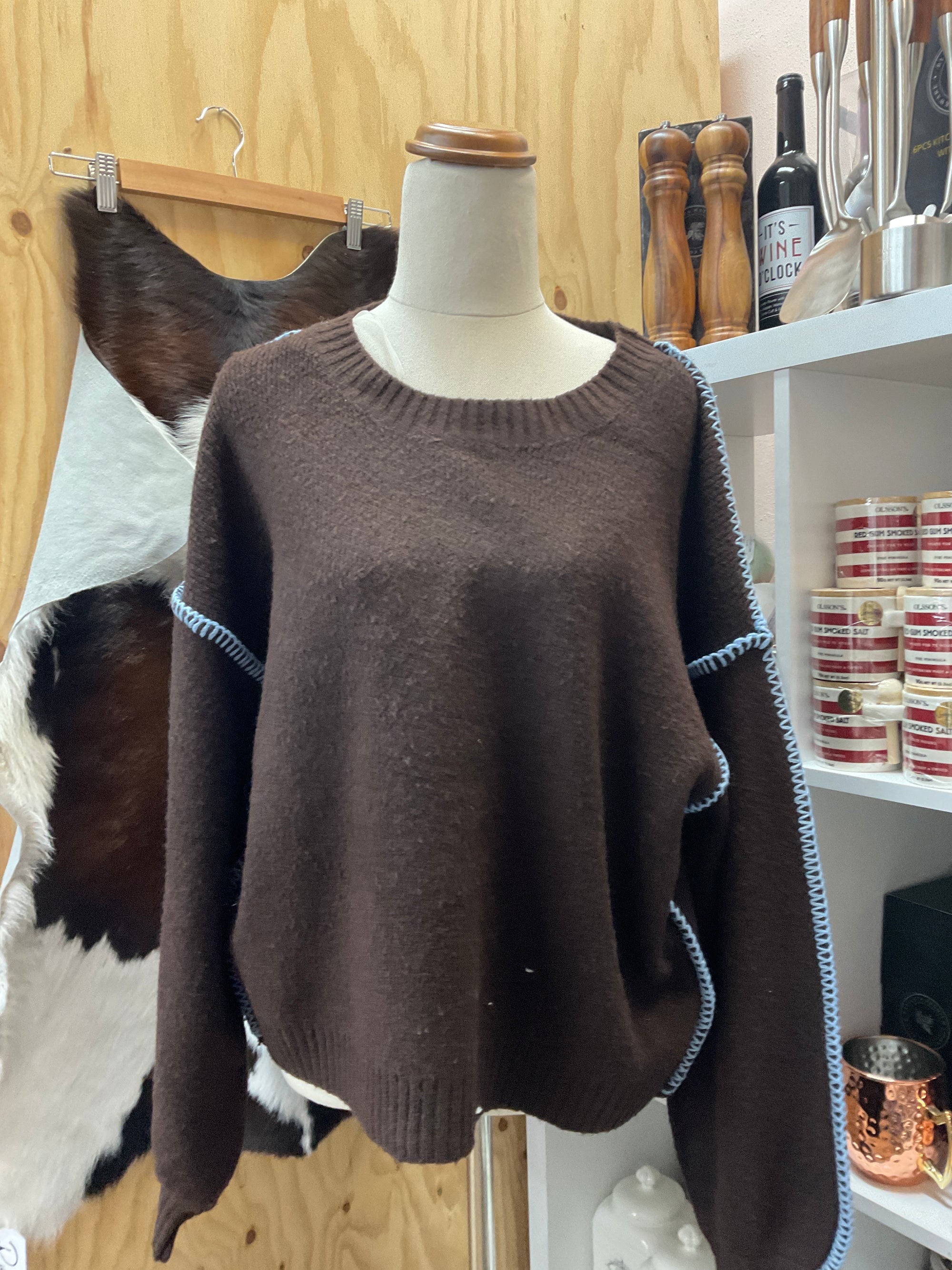 Brown knit with blue stitching