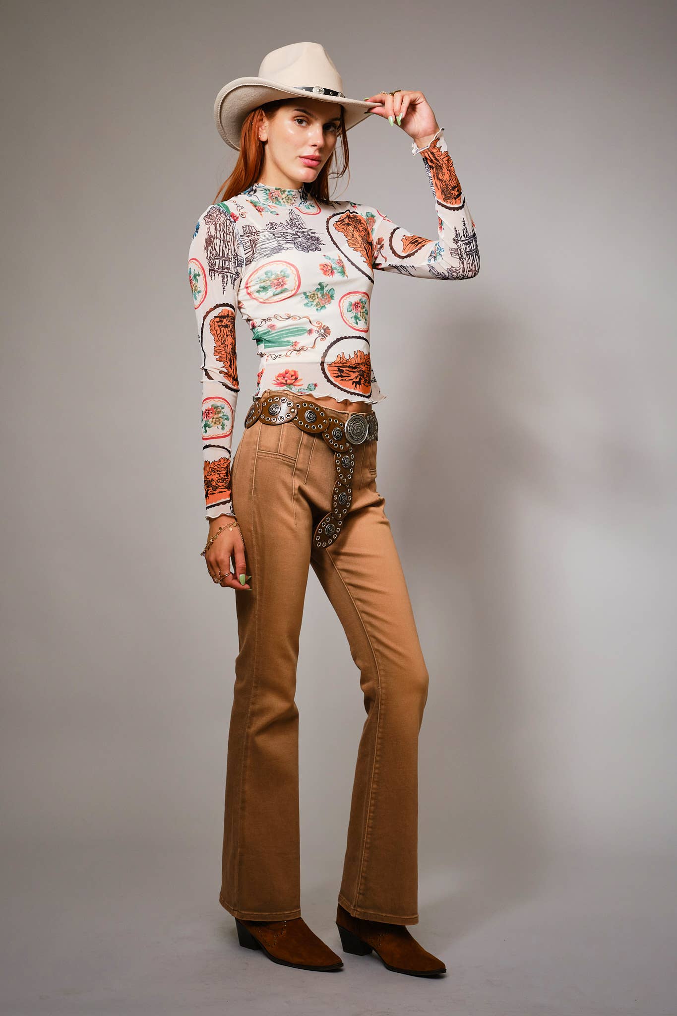 33147T Western Motif Mesh Mock Neck Top