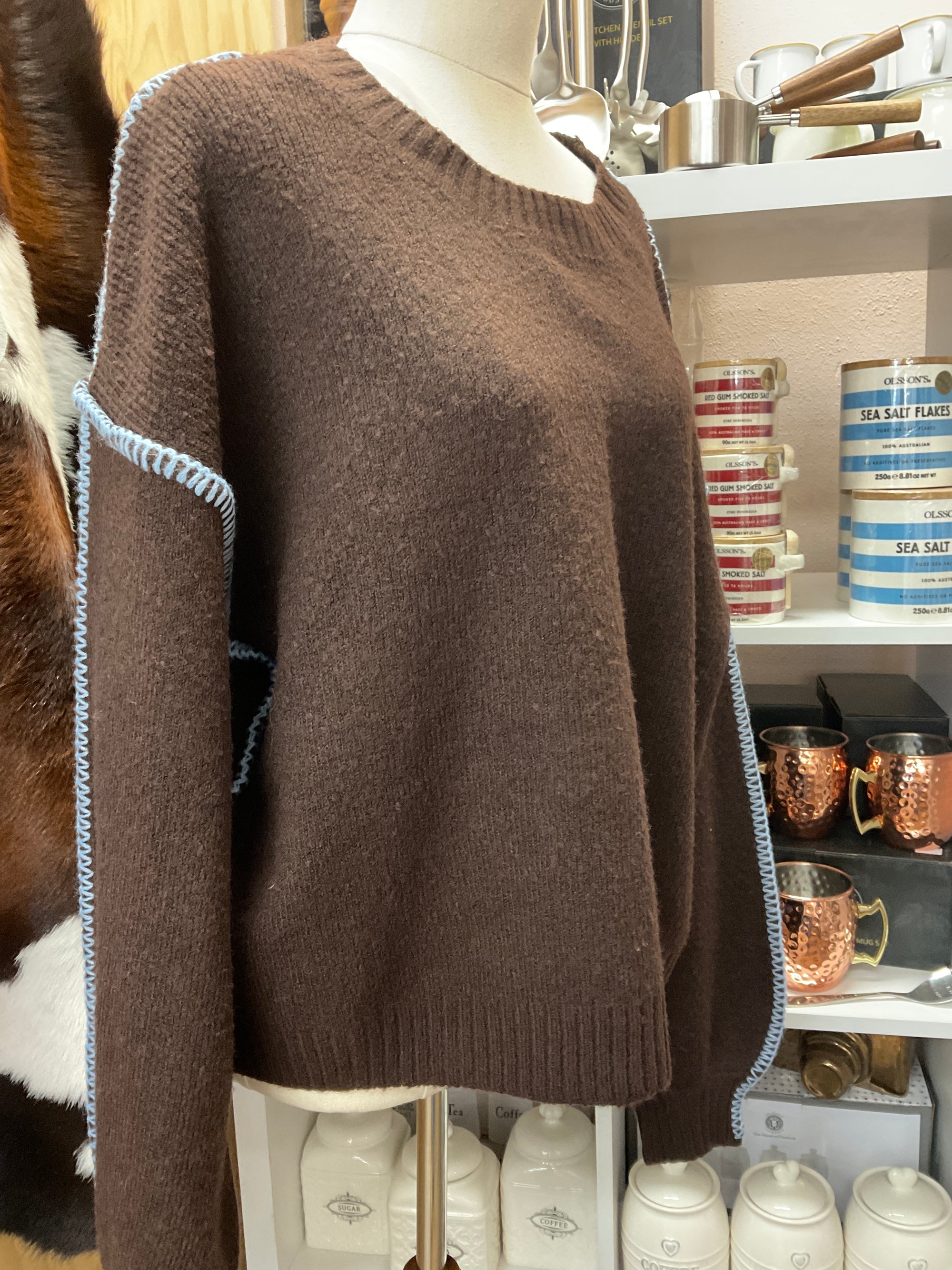 Brown knit with blue stitching